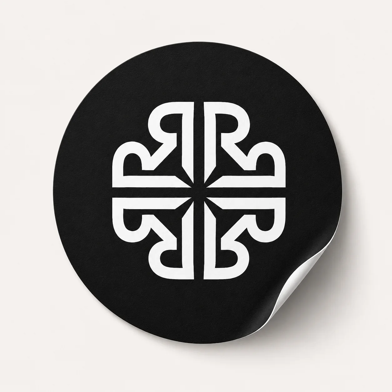 Round black Rynell monogram sticker
